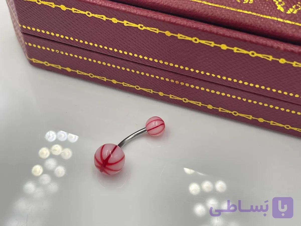 پیرسینگ دو سرپلاستیکی قرمز و سفید — تصویر 1