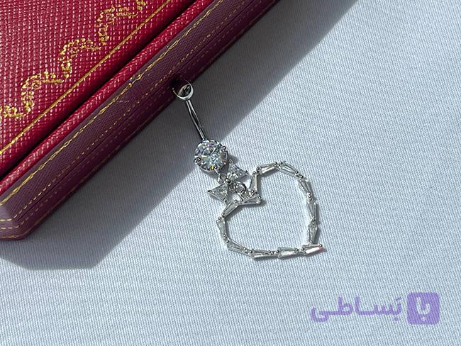 پیرسینگ ناف طرح قلب و پاپیون — تصویر 1