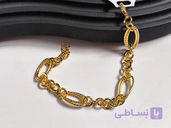 دستبند مینیمال طلایی زنانه شیک و خاص — تصویر 1