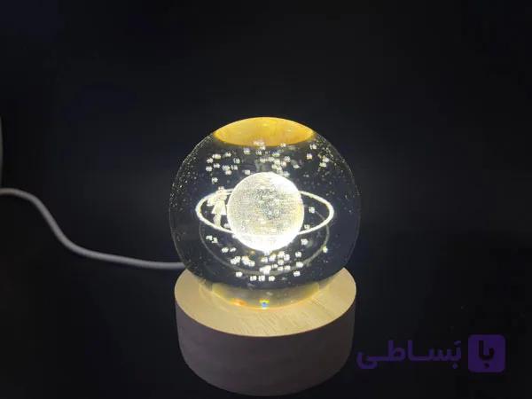 گوی دختر دور ماه شیشه ای — تصویر 1