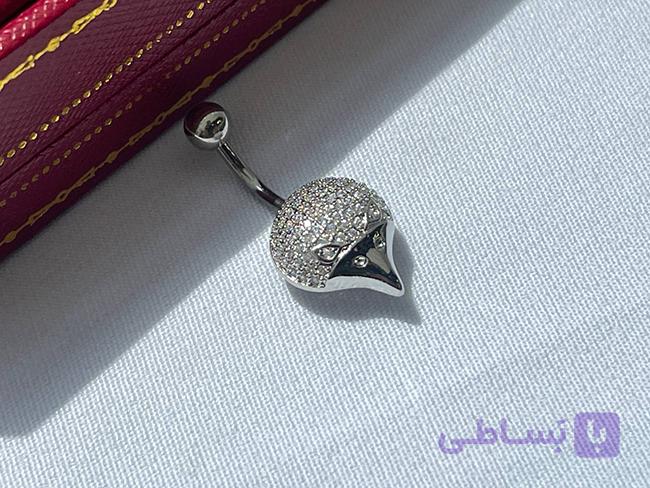 پیرسینگ ناف طرح جوجه تیغی — تصویر 1
