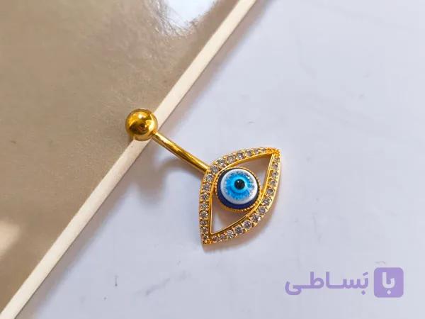 پیرسینگ ناف طرح چشم نظر نگین کاری شده — تصویر 1