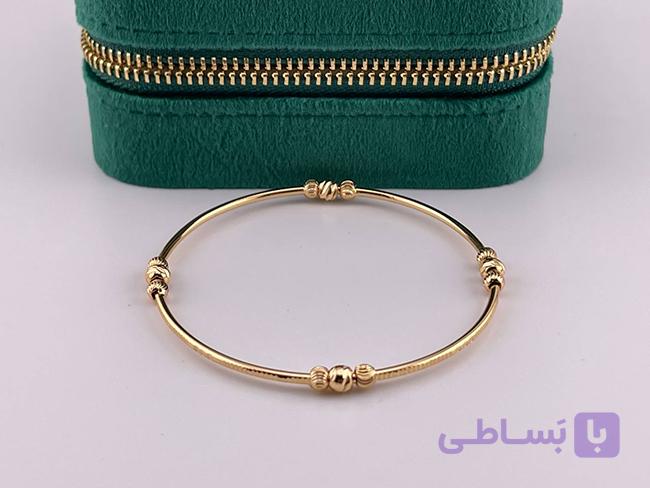 دستبند النگویی مینیمال طرح گوی طلایی — تصویر 1