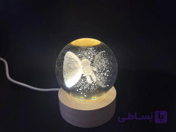 گوی کوچک شیشه ای فضا نورد و ماه — تصویر 1