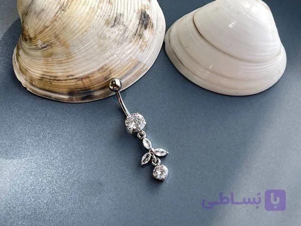 پیرسینگ طرح گل نگین دار — تصویر 1
