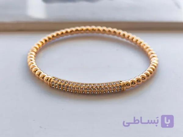 بنگل ژوپینگ طلایی طرح گوی و نگین کد 10413 — تصویر 1