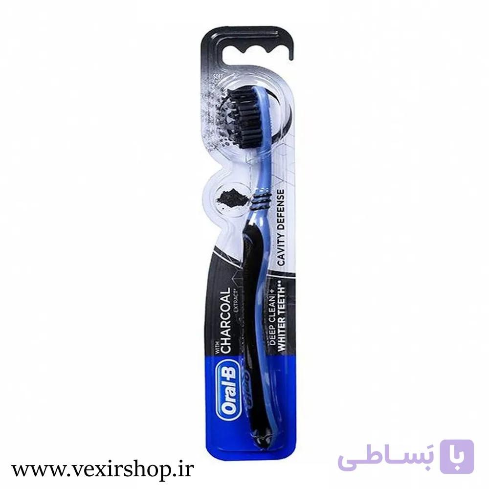 مسواک زغالی اورال بی مدل Charcoal Cavity Defense با برس متوسط — تصویر 1