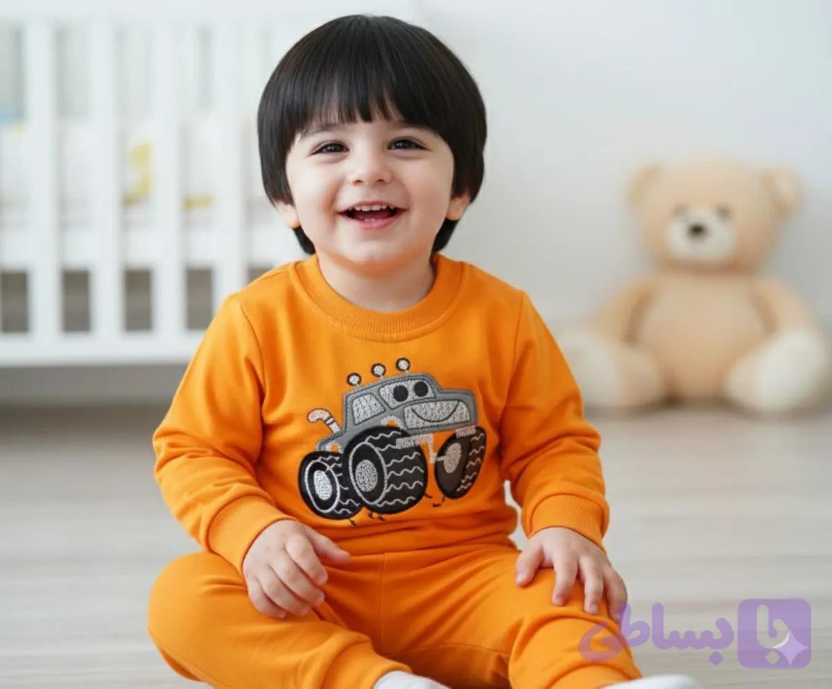 ست بلوز و شلوار بچگانه طرح ماشین هیولا رنگ نارنجی – لباس راحتی دورس پنبه‌ای