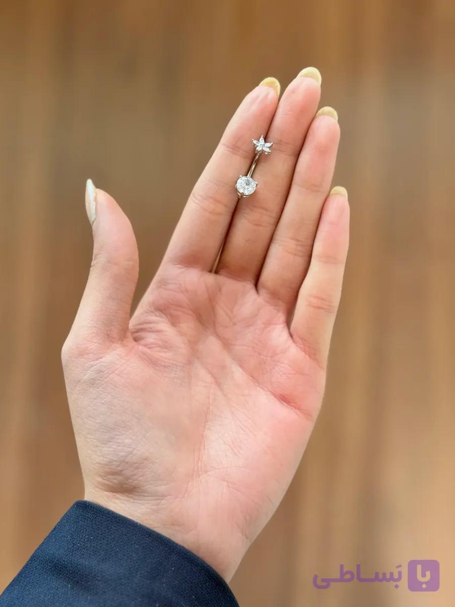 پیرسینگ ناف گل و دایره — تصویر 1
