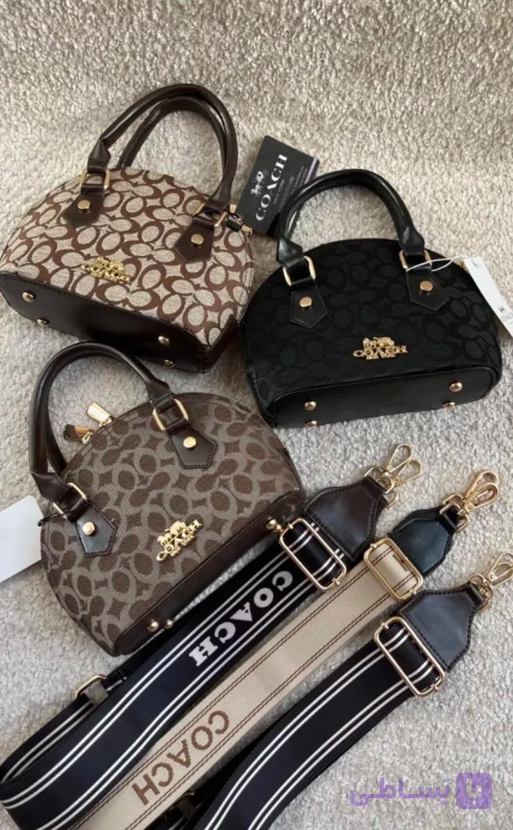 کیف دخترانه دستی / دوشی مدل نیم‌گرد جنس چرم مصنوعی طرح کوچ (Coach)