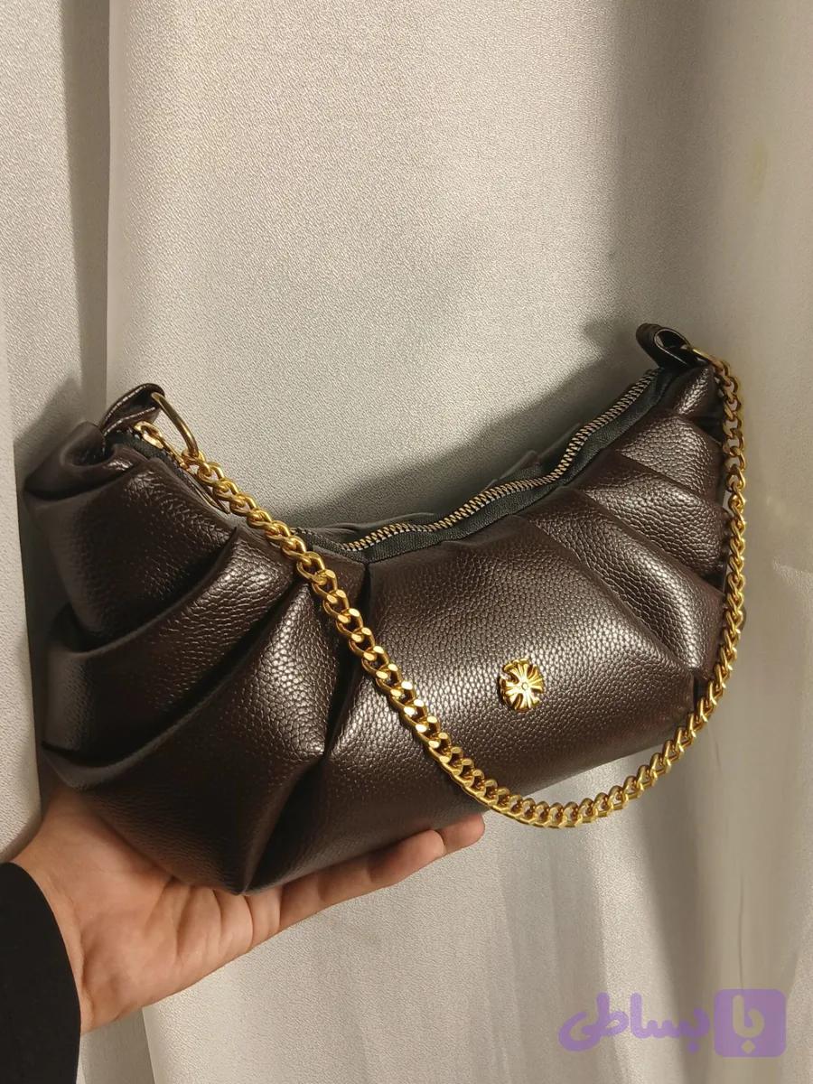 کیف زنانه طرح کروسان جنس شرانگ دارای رنگ بندی کد Dk345