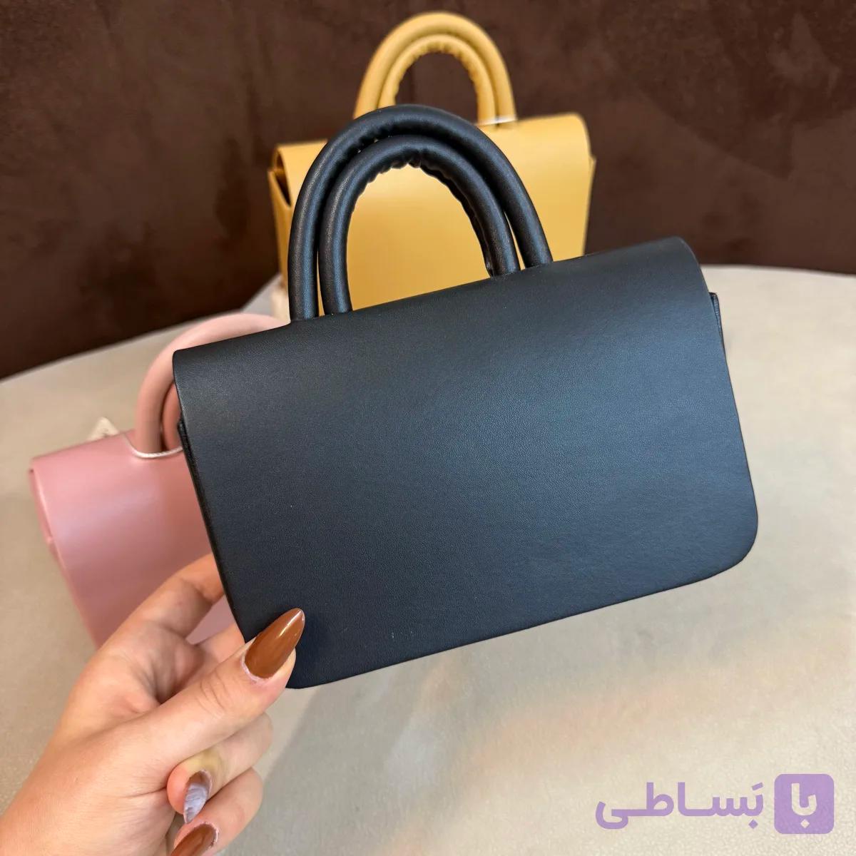 کیف دستی دخترانه پاسپورتی دسته دار مینیمال