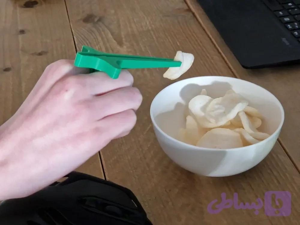 چاپستیک انگشتی گیمینگ مدل Snack Finger Clips برای خوردن چیپس و تنقلات بدون کثیف شدن دست