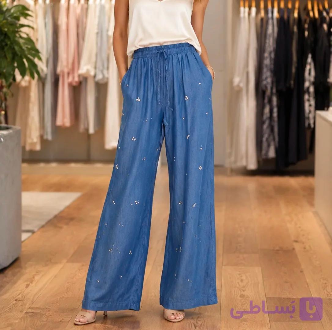 شلوار ‌پارچه ای طرح جین سنگدوزی