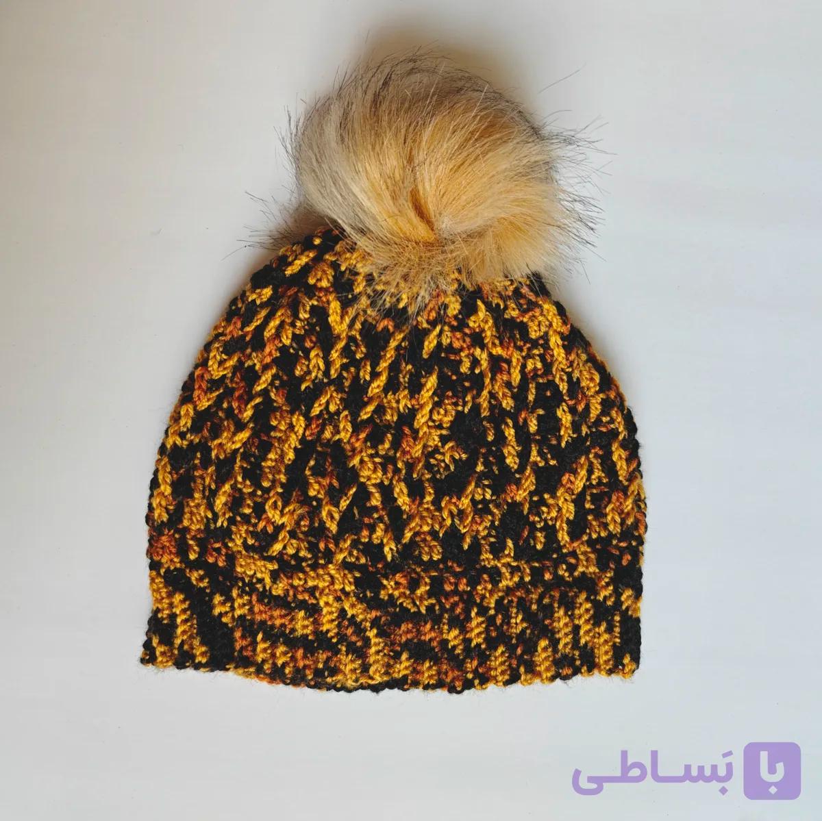 کلاه بافتنی دستبافت رنگ مشکی و زرد منگوله دار
