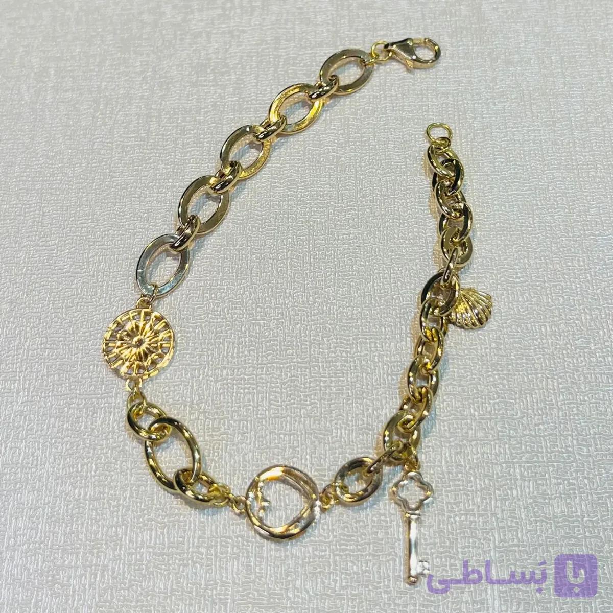 دستبند طلا 18 عیار زنجیری نیلوفر وزن 5.570 گرم اجرت ساخت ۱۳ درصد کد GD01 000260