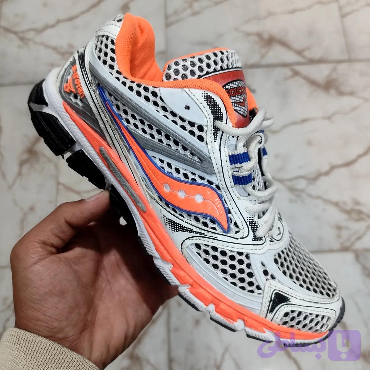 کفش مردانه ساکنی - saucony رنگ سفید نارنجی