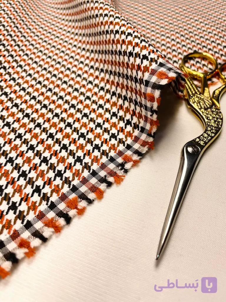 پارچه گاباردین ترک هاندستوث پی‌دوپل سفید نارنجی قهوه‌ای Braemar Ember Gabardine — تصویر 1