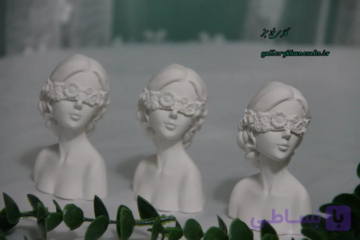 مجسمه سفید دختر بهشتی