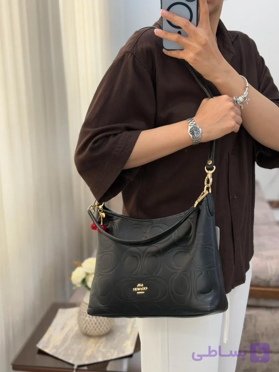 کیف بزرگ چرم مارک کوچ با چارم آلبالو