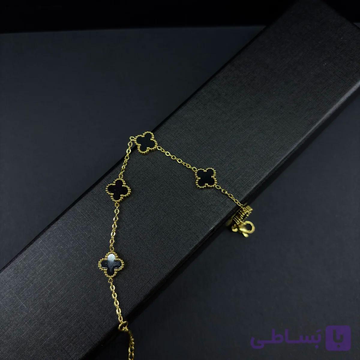 دستبند ونکلیف طلایی مشکی گل ریز
