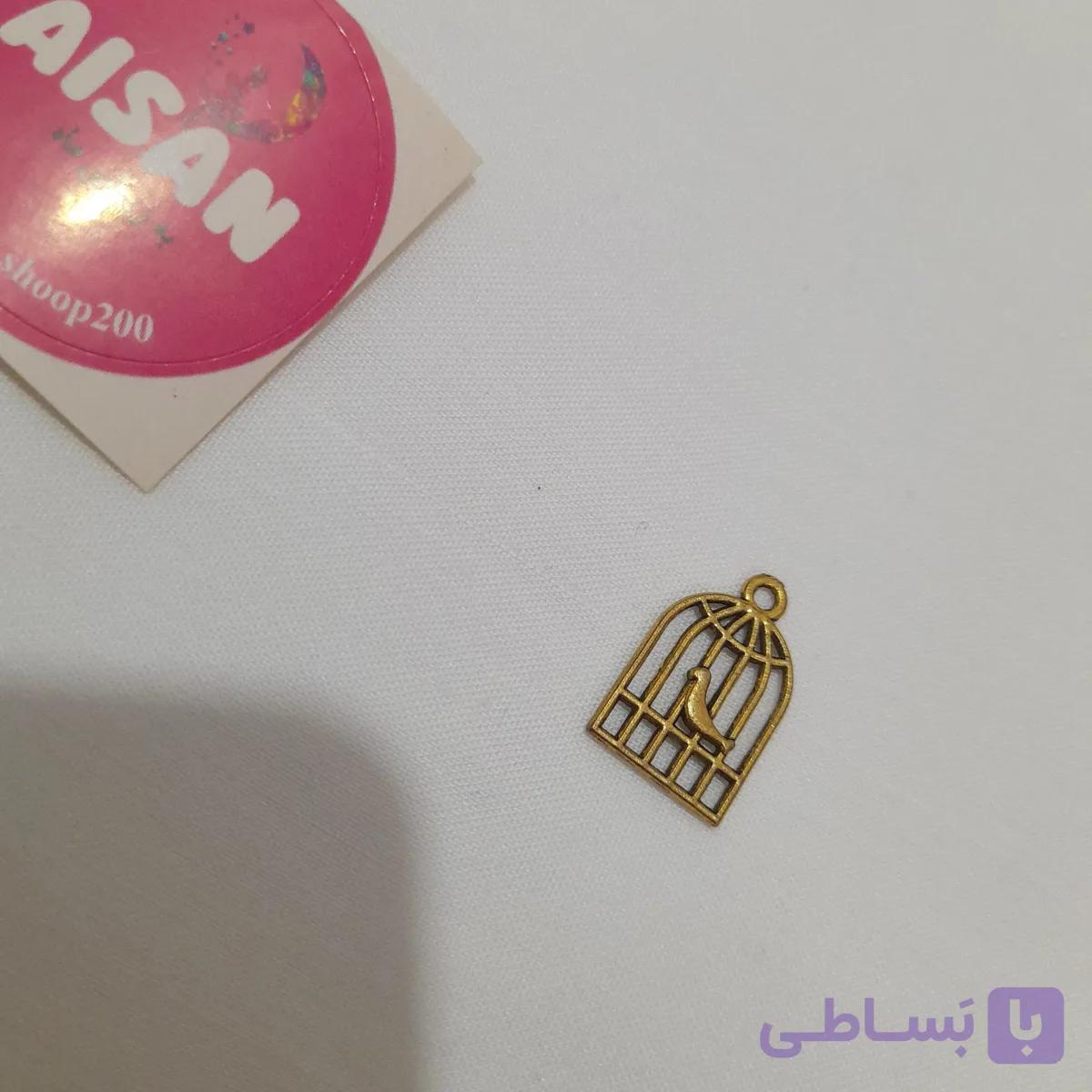 آویز فلزی طرح قفس پرنده طلایی