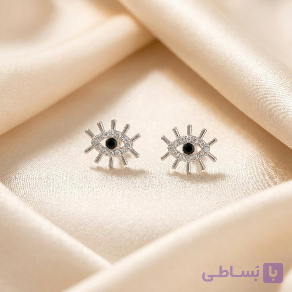 گوشواره میخی زنانه طرح چشم نگین‌دار