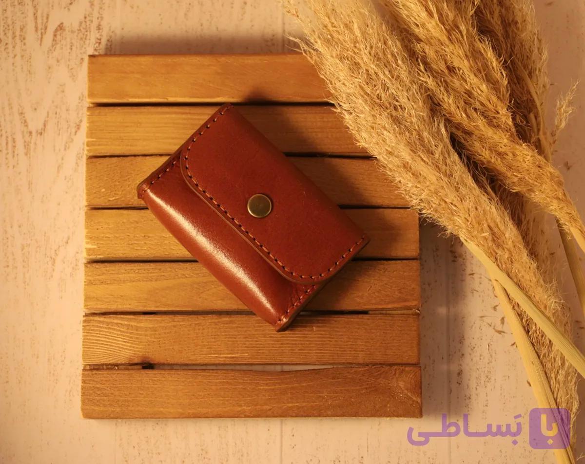 کیف کارت آکاردئونی چرم طبیعی گاوی طرح فلوتر مشکی و دستدوز