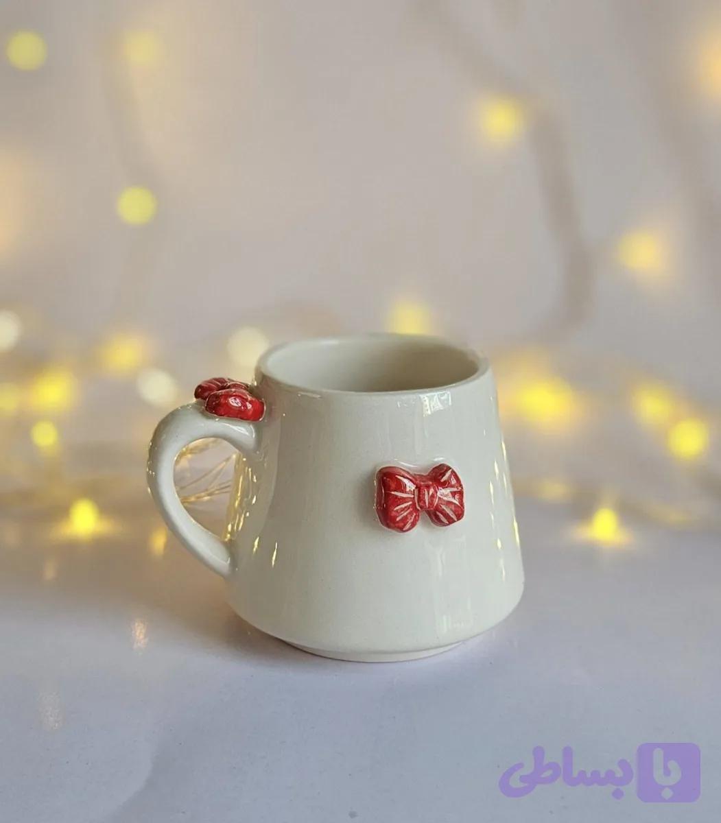 ماگ دستساز سرامیکی پاپیونی — تصویر 1
