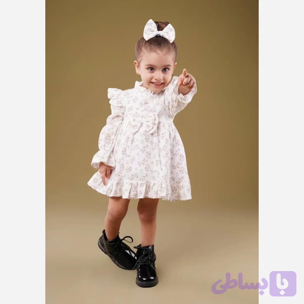 سارافون و گیره مو نوزادی گلدار آستین بلند موسلین ترک سایز 6 ماه تا 3 سال