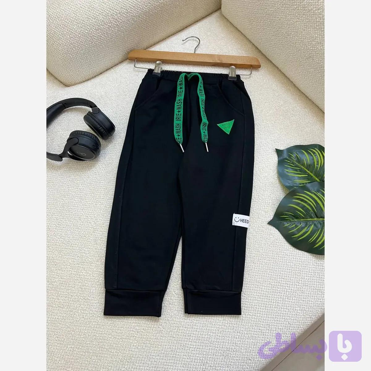 شلوار اسلش بچگانه وارداتی مشکی دورس مناسب 3 تا 8 سال سایز 110 تا 170