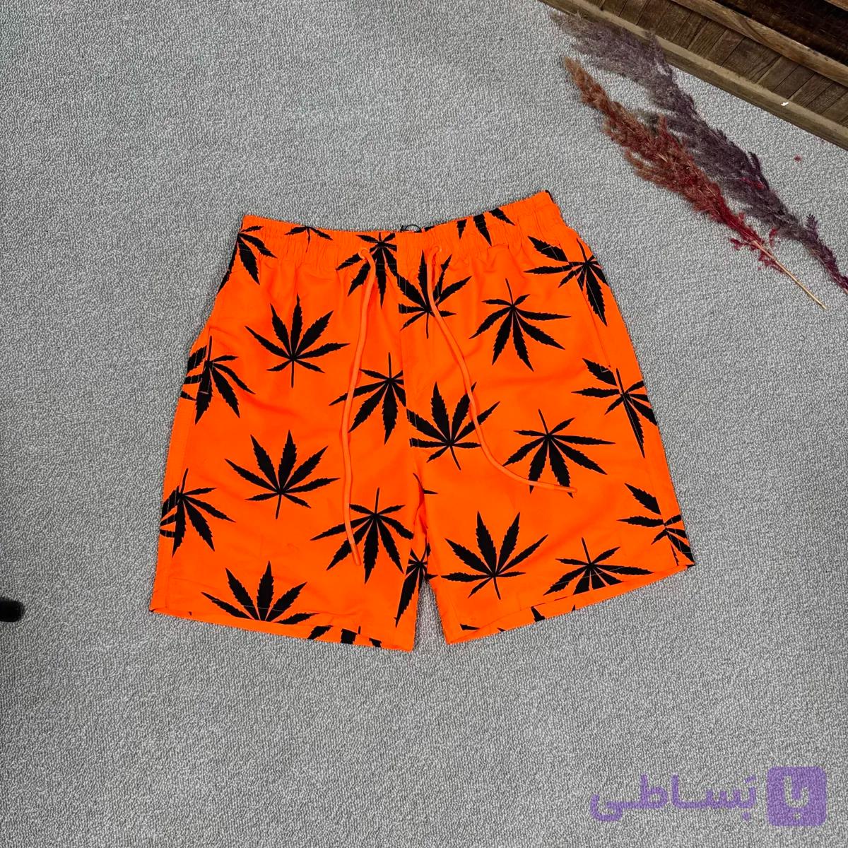 شلوارک مموری وارداتی طرح برگ رنگ نارنجی — تصویر 1