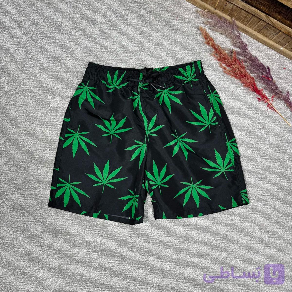 شلوارک مموری وارداتی طرح برگ رنگ مشکی — تصویر 1