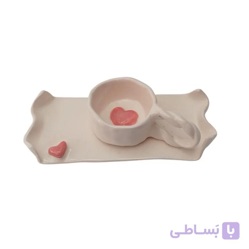 فنجان و نعلبکی سرامیکی دست ساز دفرمه مدل قلب صورتی