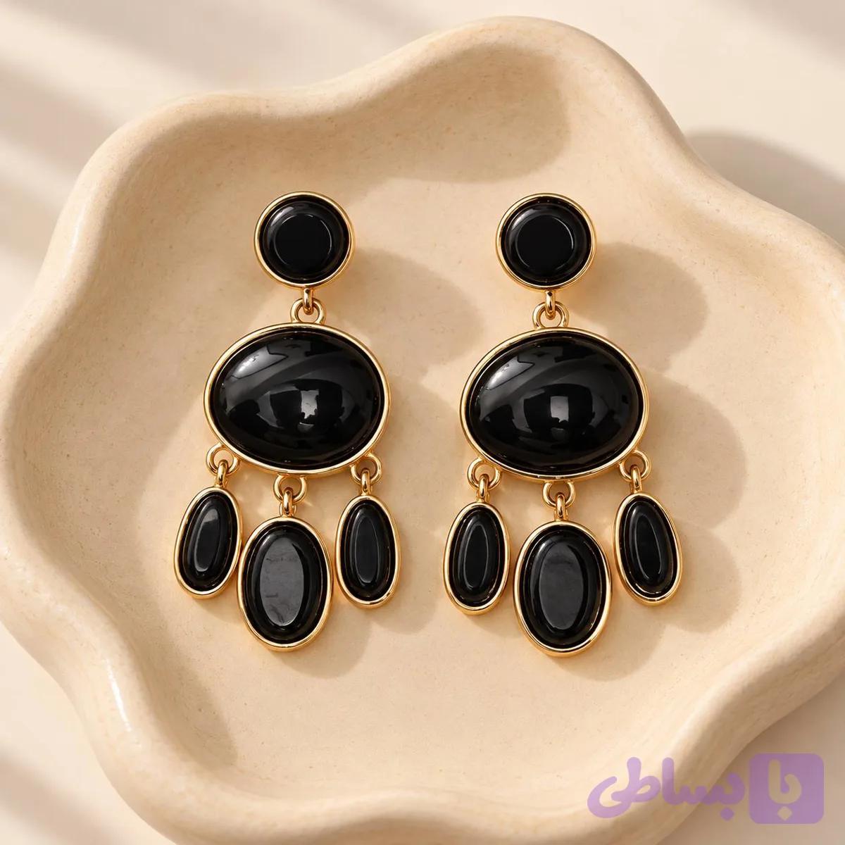 گوشواره آویز مشکی طلایی مدل سه آویز نگین بیضی — تصویر 1