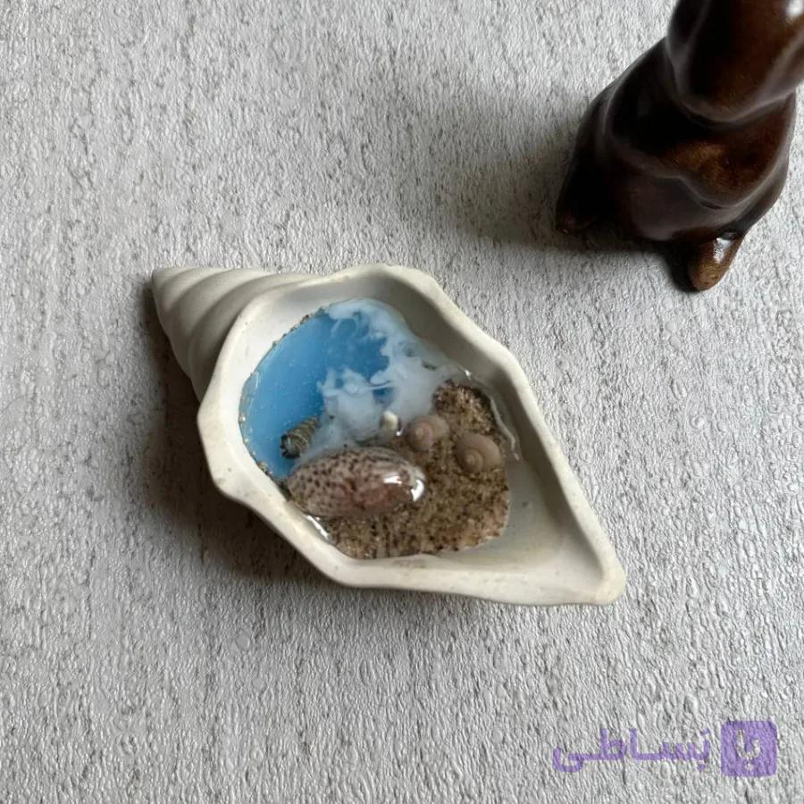 شمع دست‌ساز دریایی مدل حلزونی (طراحی ساحلی در صدف سرامیکی) — تصویر 1
