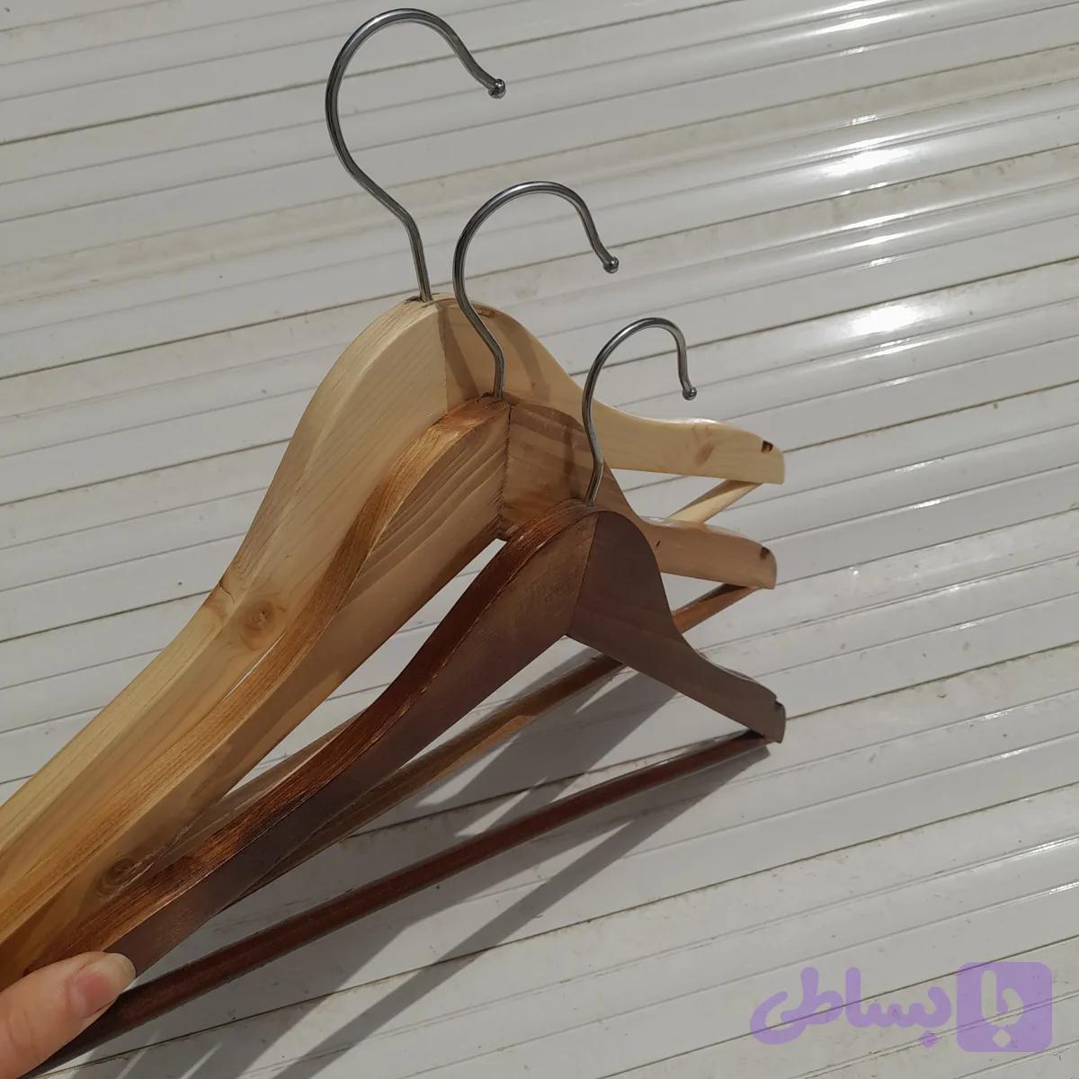 تولیدی چوب لباسی چوبی ۴۰عددی — تصویر 1