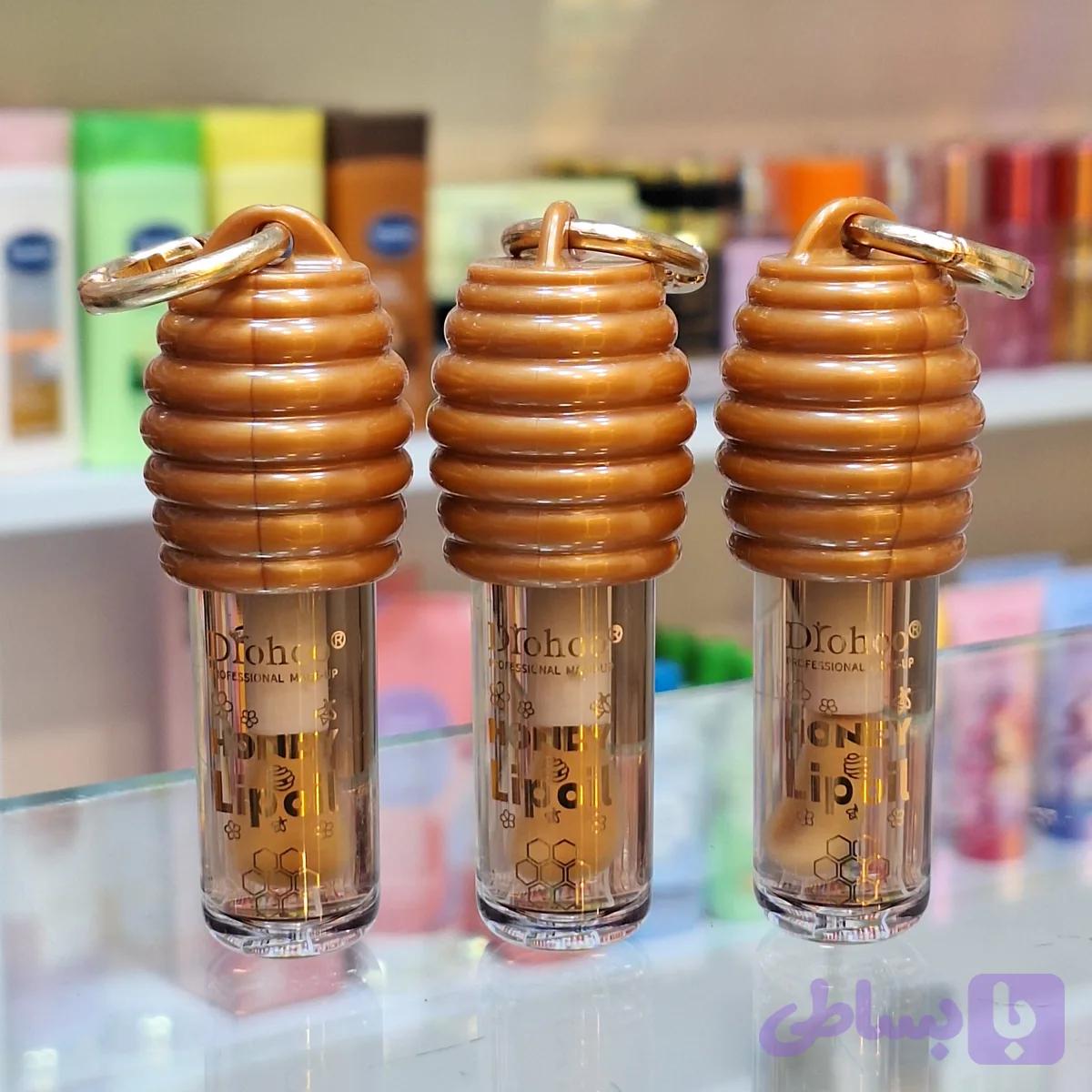 لیپ گلاس عسلی آویزدار دورهو | Diohoo Honey Lipoil / Honey Lip Oil — تصویر 1