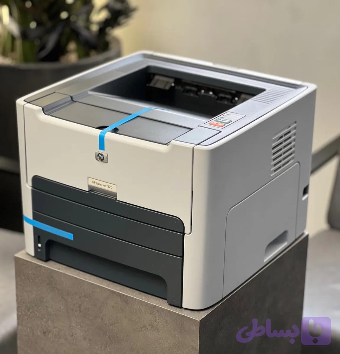 پرینتر اچ پی HP 1320dn ریفر — تصویر 1