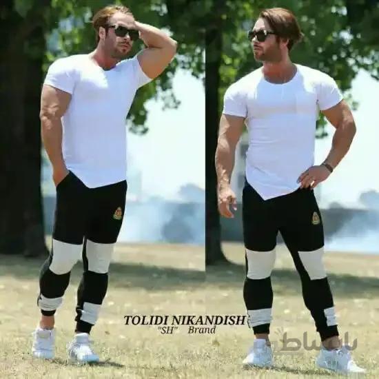 ست مردانه کد 197 تیشرت آستین کوتاه و شلوار اسلش طرح نوار تک خط ا Men's set, code 197, short-sleeved T-shirt and slash pants, single line bar design