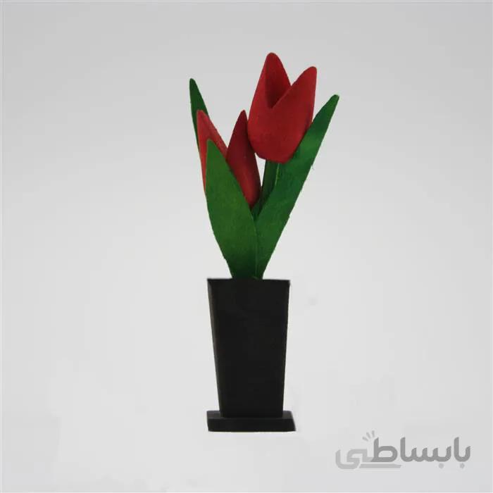 گلدان به همراه گل مصنوعی مدل لاله فانتزی ا گل لاله چوبی رو میزی از سری محصولات زینتی برای منازل میباشد که به صورت بسیار جذاب و مینیمال طراحی شده
