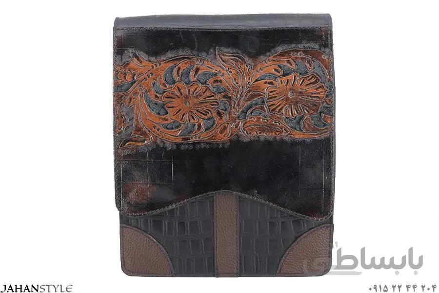 کیف دوشی چرم طبیعی مشکی قلمزنی طرح گل