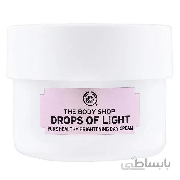 کرم ضد لک و روشن کننده بادی شاپ THE BODY SHOP مدل دراپس آف لایت DROPS OF LIGHT حجم 50 میل ا The Body Shop Drops Of Light Brightening Day Cream 50ml