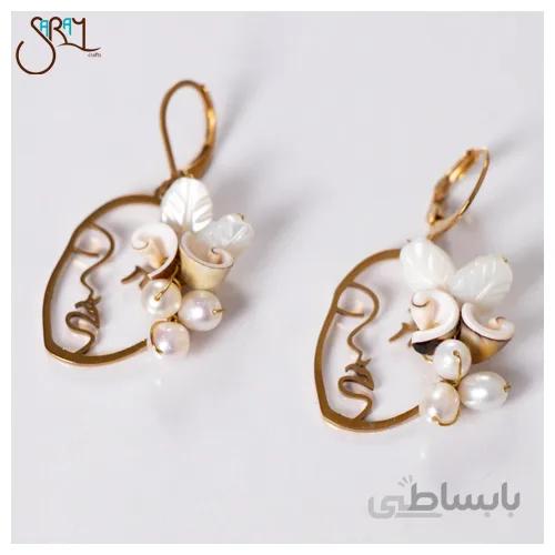 گوشواره استیل با طرح چهره و صدف مدل 2103