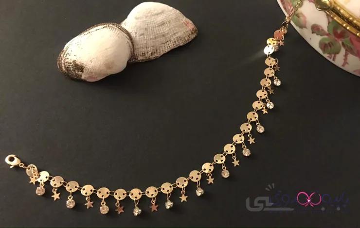 پابند آویزدار ستاره ای وای اس ایکس