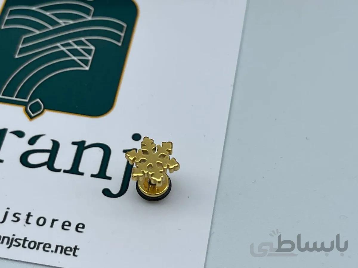 پیرسینگ گوش دانه برف طلایی