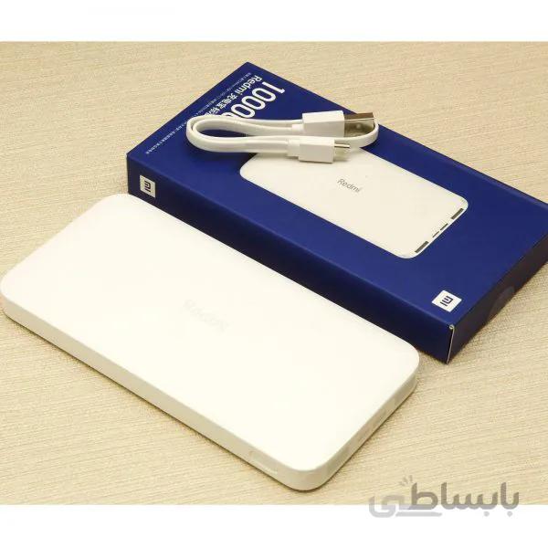 شارژر همراه شیائومی مدل Redmi ظرفیت ۱۰۰۰۰ میلی آمپرساعت به همراه کابل تبدیل microUSB