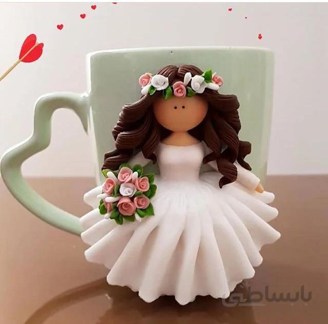 لیوان عروسک خمیری کله فندقی کد ۱۰۱۰۲۹