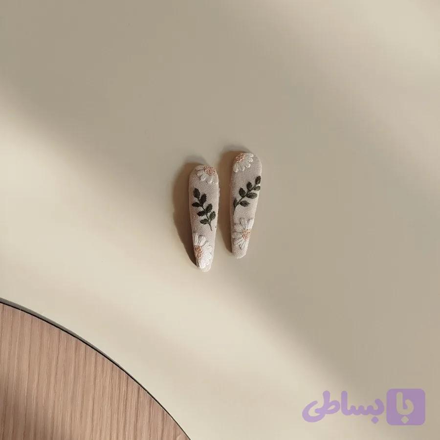 گیره سر برگ و گل بابونه