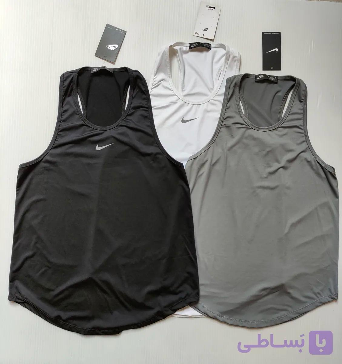 تاپ ورزشی دخترانه طرح نایکی